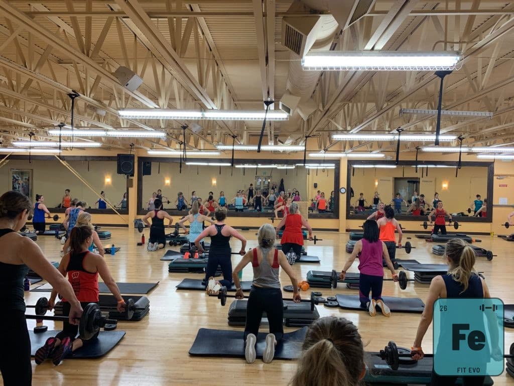 A Fitness Evolution Bellingham member training in the gym