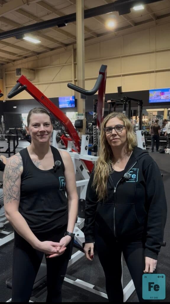 Two FIT EVO trainers on the gym floor.
